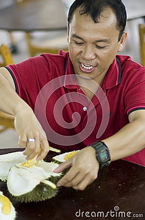 Taste of durian fruit Stock Photo