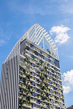 A tastefully contemporary green facade of a multi-storey building Stock Photo