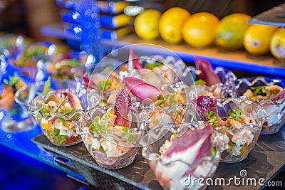 Tasty appetizers in the small glasses in the buffet Stock Photo