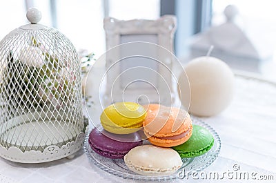 Tasty beautiful macaroons on a beautiful table in the style of P Stock Photo
