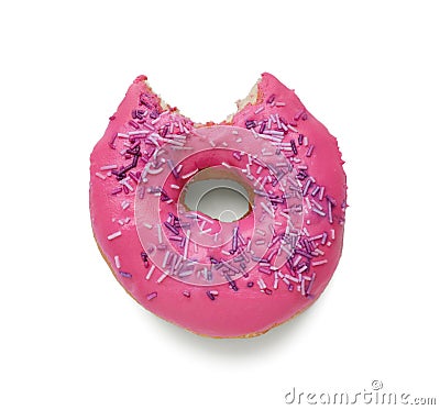 Tasty bitten glazed donut decorated with sprinkles isolated on white, top view Stock Photo