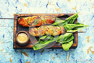 Chicken shashlik with peanut sauce Stock Photo