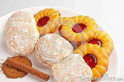 Tasty colorful cookies on white plate Stock Photo