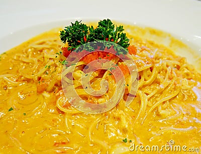 Tasty crab spaghetti with ebiko Stock Photo