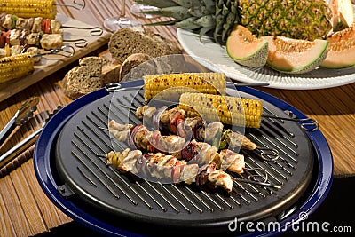 Tasty crispy chicken with baked vegetables Stock Photo