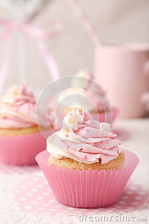 Tasty cupcake on a pink background Stock Photo