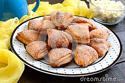 Tasty curd cheese cookies on a plate. Goose foot cookies. Homemade cakes for breakfast Stock Photo