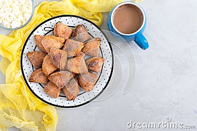 Tasty curd cheese cookies on a plate. Goose foot cookies. Homemade cakes and coffee for breakfast Stock Photo