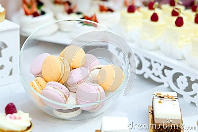 Tasty desert sweet macarons on wedding, close up Stock Photo