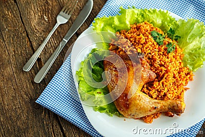 Tasty dish of chicken thigh with rice Stock Photo