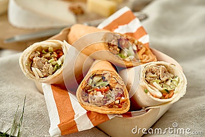 Tasty doner kebabs or wraps at a summer picnic Stock Photo