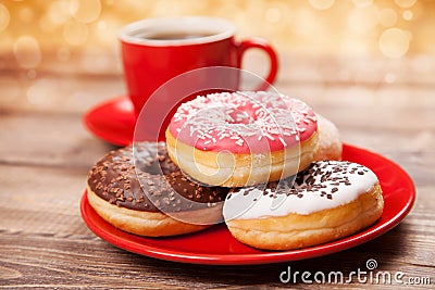 Tasty donut with a cup of coffee Stock Photo