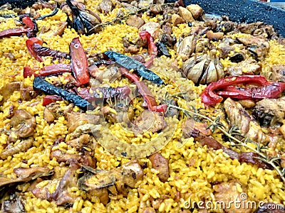 A tasty and flavour typical food dish called `paella`. Stock Photo