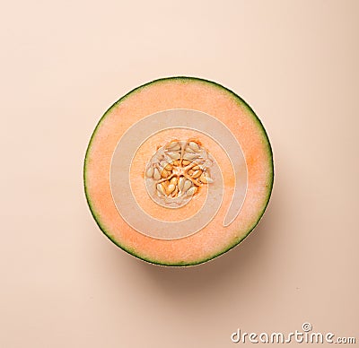 Tasty fresh yellow appetizing cut melon pastel background Stock Photo