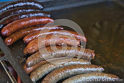 Tasty fried sausage, Street food Stock Photo