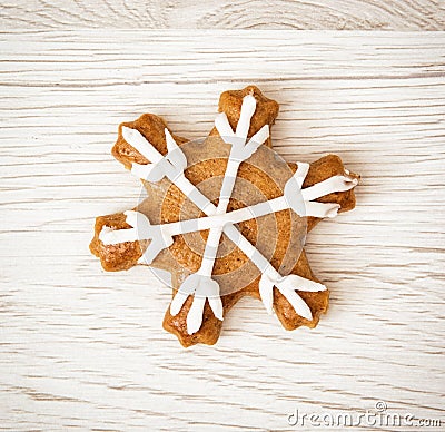 Tasty gingerbread star, wooden background Stock Photo