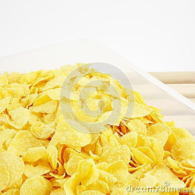 The tasty golden corn flakes in plastic container box Stock Photo