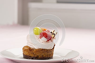 Tasty gourmet dessert with fresh fruit topping Stock Photo