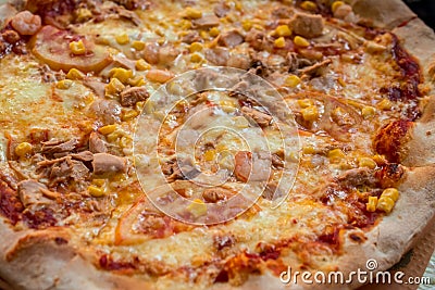 Tasty Greek pizza on a thin pastry base Stock Photo