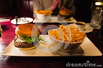 Tasty hamburger & fries at Baton Rouge restaurant MontrÃ©al Stock Photo