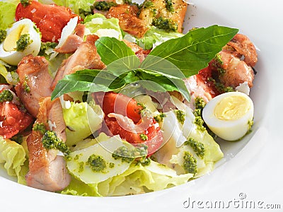 Tasty healthy Caesar salad with sweet basil and lettuce Stock Photo