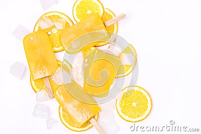 Tasty Homemade Popsicles with Orange Juice Ice Fruit Lollies on Sticks Ice Cube Top View Flat Lay Horizontal White Background Stock Photo