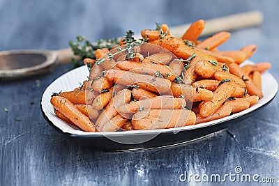 Tasty Honey Glazed Baby carrots Stock Photo