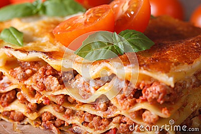 Tasty lasagna with basil and tomatoes macro horizontal Stock Photo