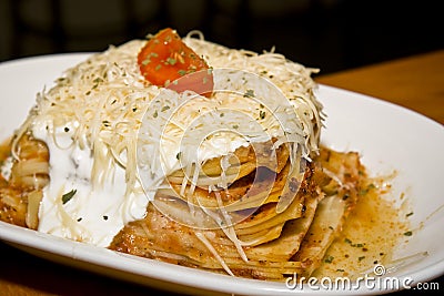 Tasty lasagna on white plate Stock Photo