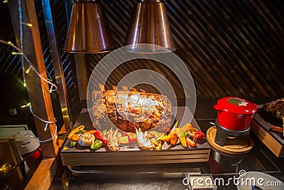 Tasty looking roasted meat with vegetables on the table at the buffet Stock Photo