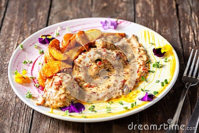 Tasty lunch on a well decorated plated being served Stock Photo