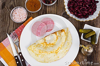 Tasty omelette and chicken ham for breakfast Stock Photo