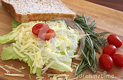 Tasty open sandwich on wholewheat bread Stock Photo