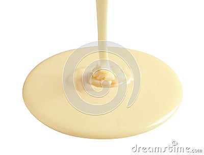 Tasty pouring condensed milk on white background Stock Photo