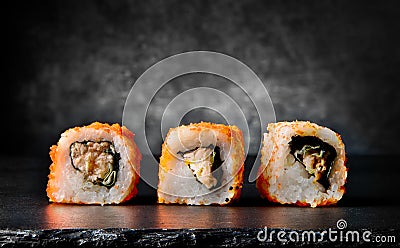 Tasty rolls on black Stock Photo
