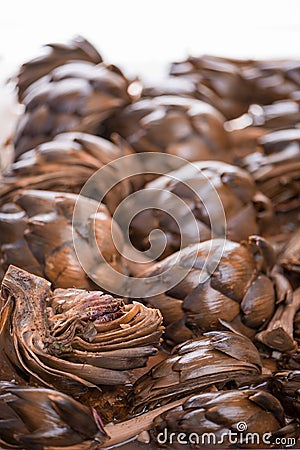 Tasty roman style backed artichokes, close up Stock Photo