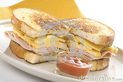 Tasty sandwich of ham and cheese omelet Stock Photo