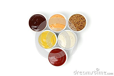 Tasty sauces in bowls isolated on background Stock Photo