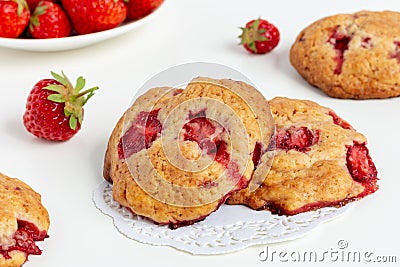 Tasty shortbread cookies with juicy strawberries Stock Photo