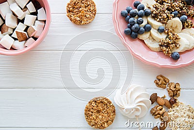 Tasty snacks on white table, different kinds of fruits and cookies, copy space Stock Photo