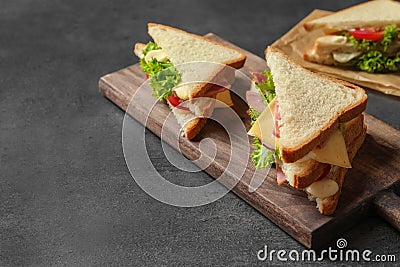 Tasty toast sandwiches on table Stock Photo