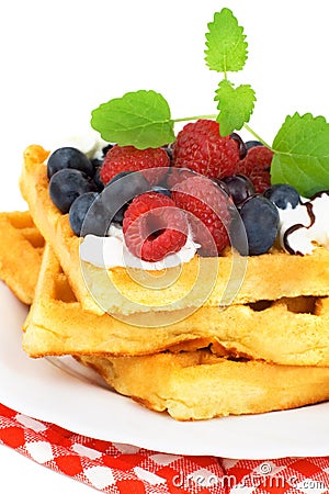Tasty waffles with summery fruits Stock Photo