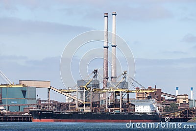 Bulk carrier SAGAR SAMRAT at Tata Steel steelworks in IJmuiden, The Netherlands Editorial Stock Photo