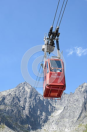 Tatranska lomnica cable car with mountain in portait aspect Editorial Stock Photo