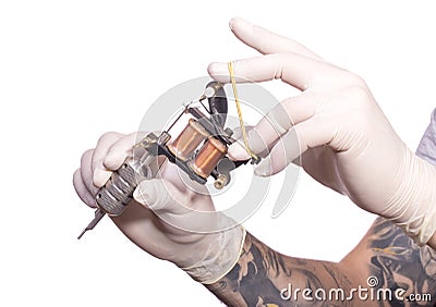 Tattoo artist at work. Preparing the needle and Editorial Stock Photo