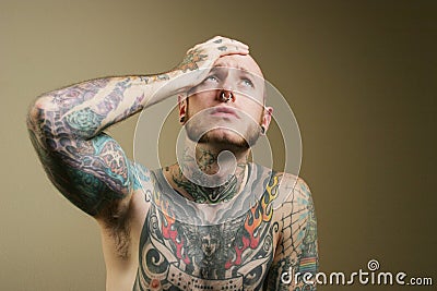 Tattoo man - regret Stock Photo