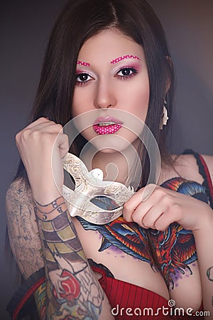 Tattoo model with bright make-up Stock Photo