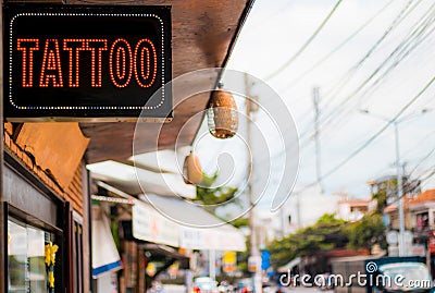 Tattoo with a sign on the street Stock Photo