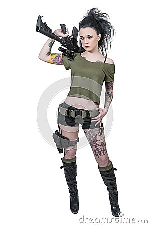 Tattooed Woman with Assault Rifle Stock Photo