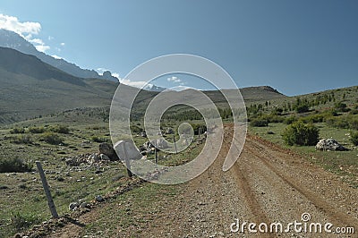 Taurus Mountains on the background of sky. Vertices covered with snow. Tourism Stock Photo